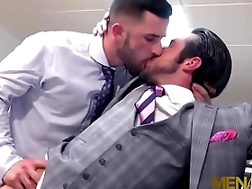 Muscular men in suits, Mike De Marko and Sunny Colucci, engage in a gay orgy at MENATPLAY.