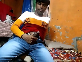 A young black man masturbates and enjoys fetish play.