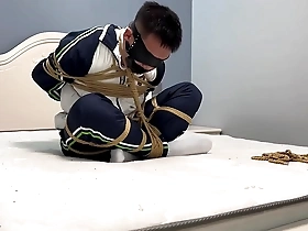 Asian boy in Ebi-position bondage with blindfold and tapegag