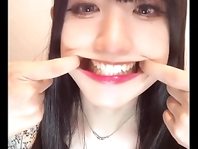 Beautiful crossdresser Chikas tooth fetish: A short and sexy video.