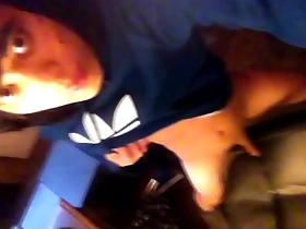 Young Asian guy with emo look masturbates in his Adidas hoodie