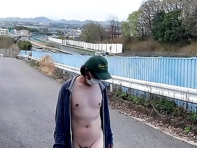 Mayu-chan, a female crossdresser, likes to undress and expose herself in a number of different ways in public places.
