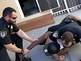 Uniformed officers from GAY PATROL apprehend a black suspect, they are not joking around.