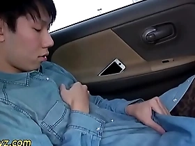 Asian twink in cockring and harness in a fetish video
