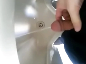 Solo boy pees in the bathroom