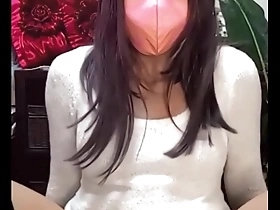 Beautiful Japanese ladyboy masturbates while live streaming.