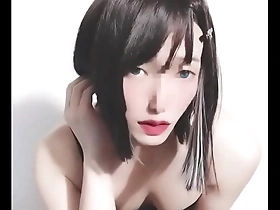 Japanese crossdresser in female attire