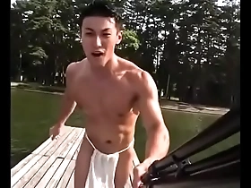 Muscular Japanese friend shows off his body