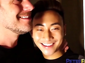 Jeremy Vuitton, a gay Asian man, gets raw bred by Hans Berlin in a PeterFever scene.