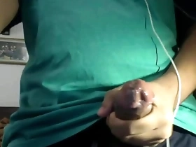 A hot Indian man masturbates and shows off his large penis with precum.