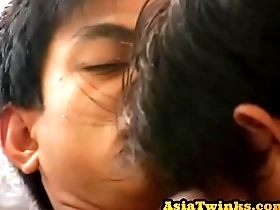Young Japanese twink gets anal sex after giving blow job in missionary position.