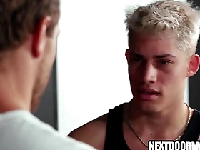 Muscular men having sex in the gym