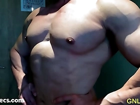 Muscular Asian man pleasuring himself and teasing his nipples.