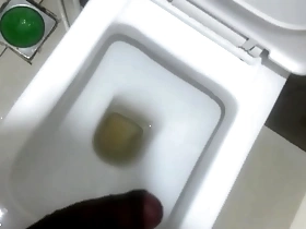 Hot Indian gay masturbates in office bathroom