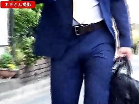 Gay Asian men in suits.
