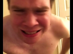 A pitiful man cries and whimpers while he spanks himself.